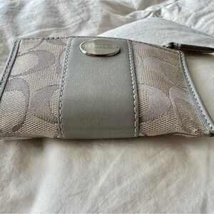Coach Silver and Gray Logo Zipper Wallet
Leather and Material
